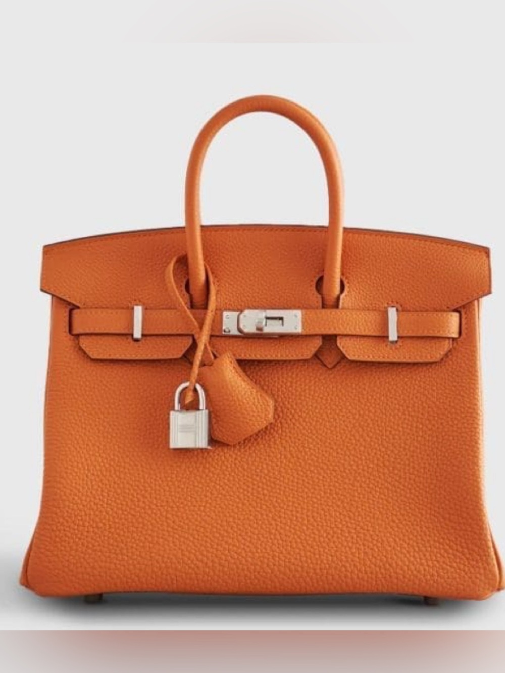 Absolutely stunning real leather Togo orange palladium hardware size25 brand new
